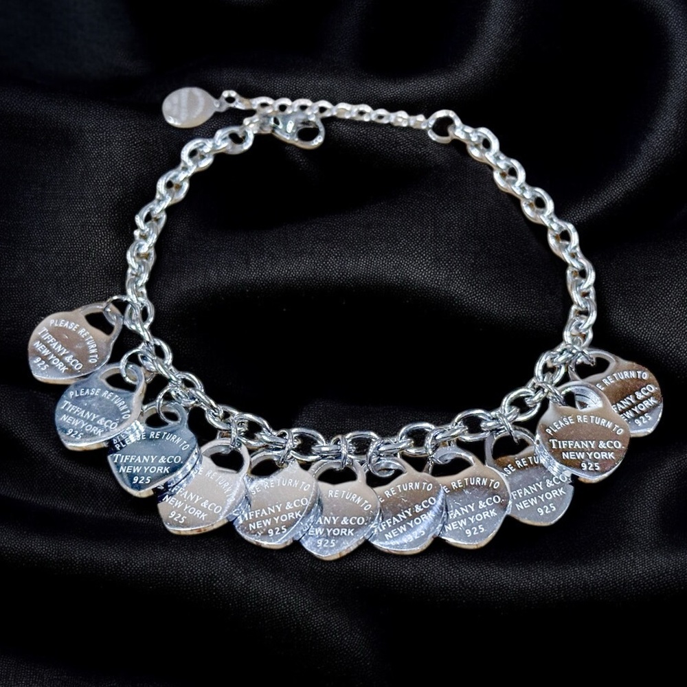 New Stainless Steel Bracelet with Dangling Hearts